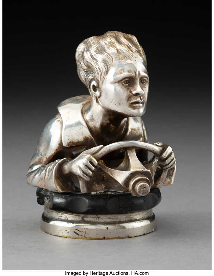 photograph - silver statuette